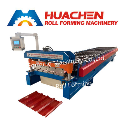 A metal roof panel manufacturing machine for producing tile-shaped corrugated roof panels by rolling process