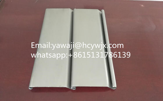 ইস্পাত শীট রোলার শাটার ডোর রোল ফর্মিং মেশিন রোল আপ ডোর ফর্মিং মেশিন